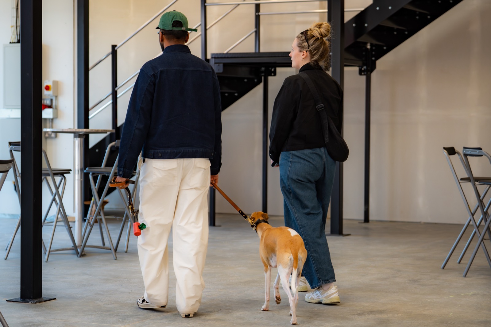 A guest tours the new space with their dog