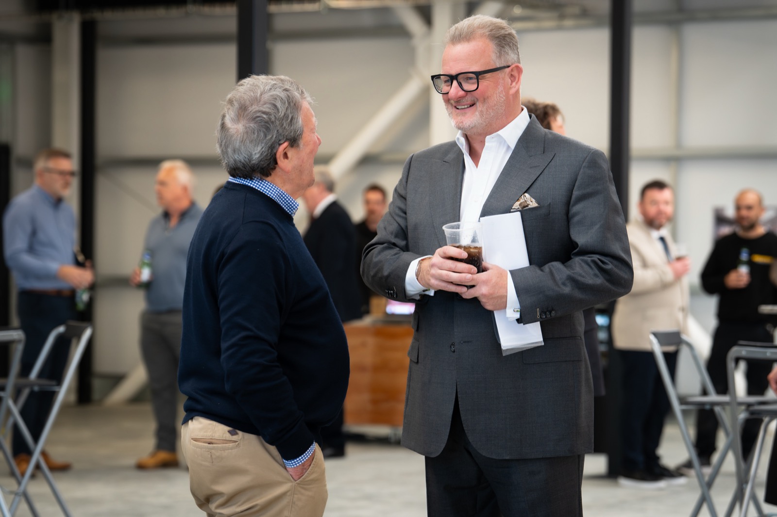John O'Neill in conversation with a guest